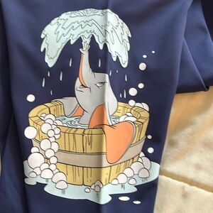 Disney sweatpants with Dumbo on side of leg.